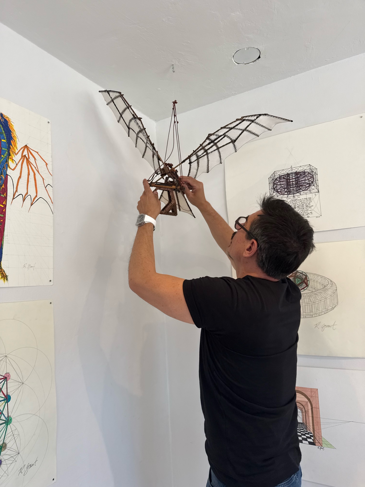 Robert Edward Grant installing the Da Vinci ornithopter model at CODEX