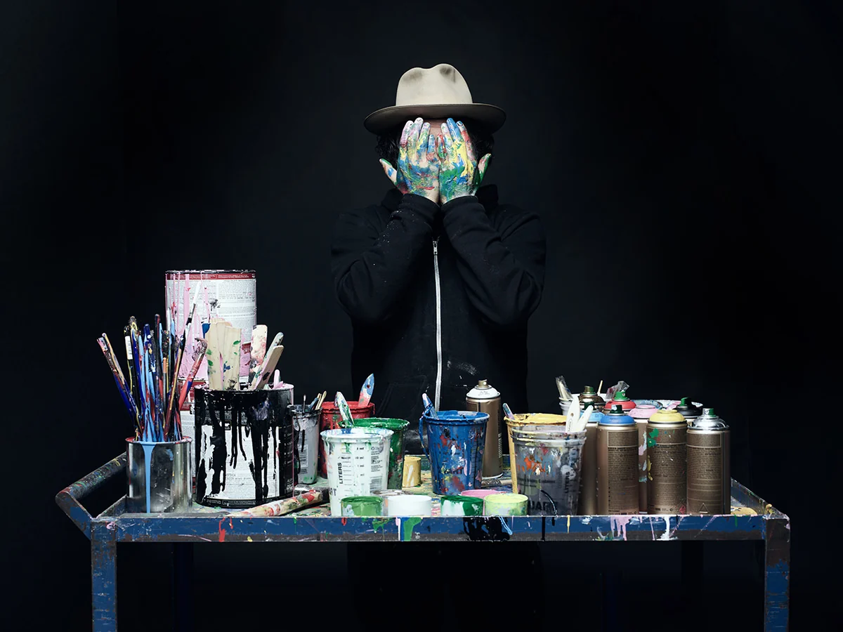 Mr. Brainwash in his studio