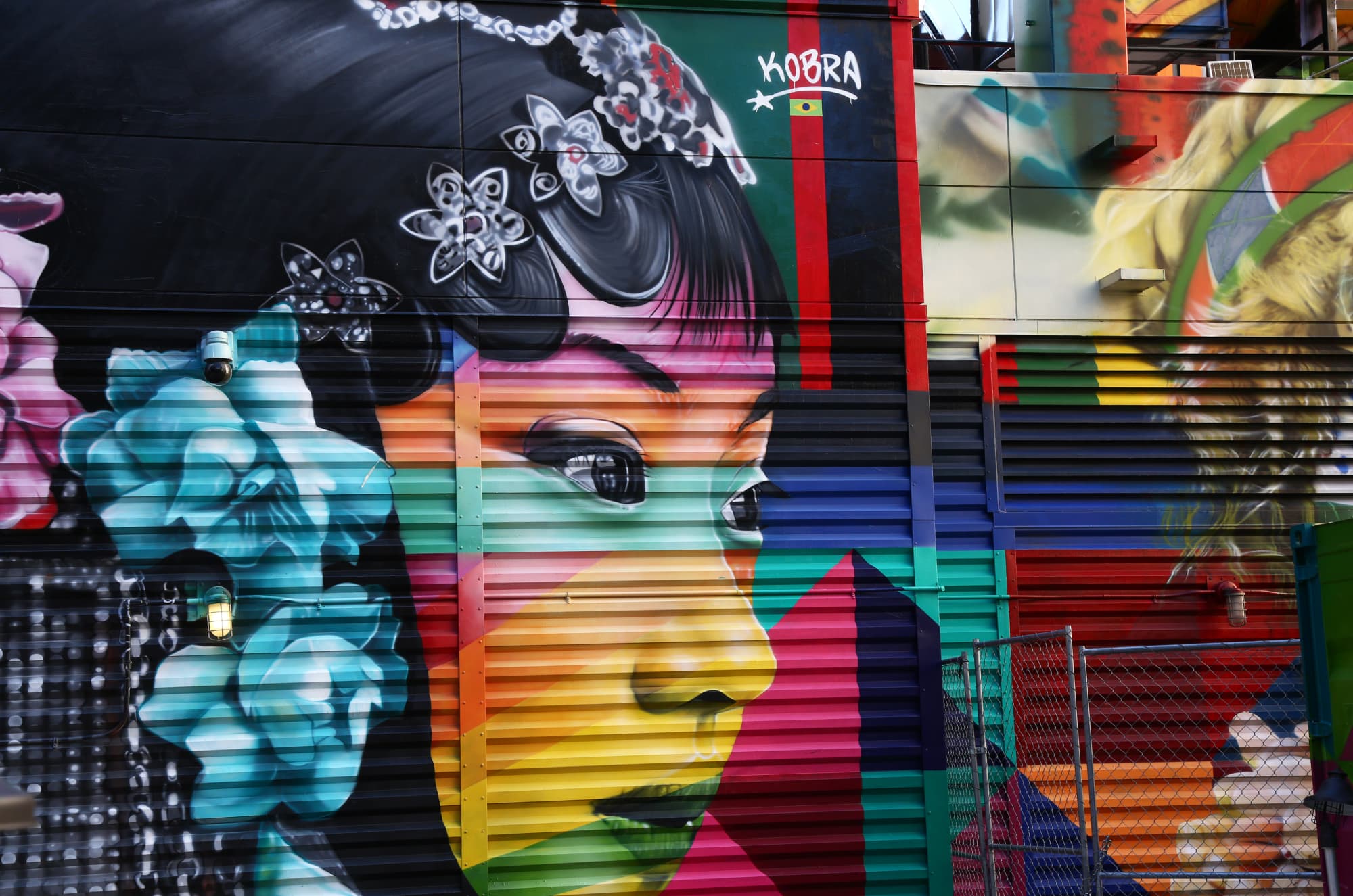 Eduardo Kobra's Welcome to the WTC mural at the World Trade Center campus, Lower Manhattan — five women representing the five continents